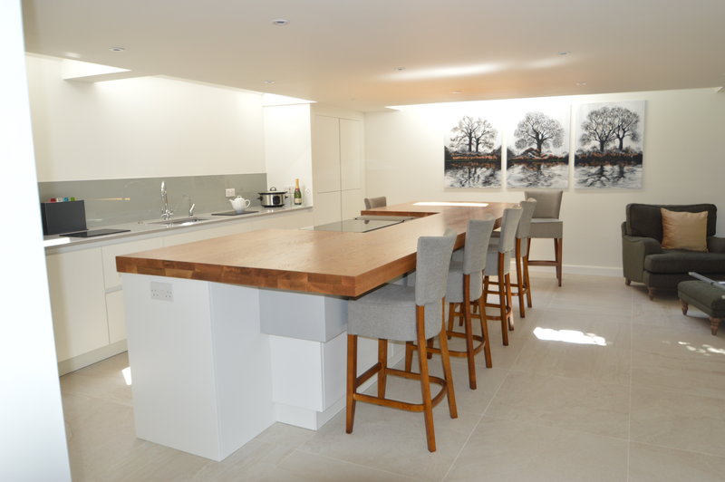 Double thickness oak breakfast bar with hob cut-out